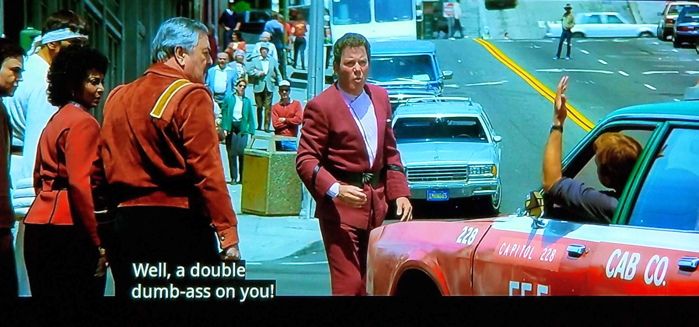 Screencap from Star Trek IV. Captain Kirk says, 'Well, a double dumb-ass on you!'
